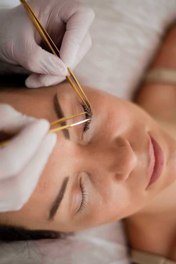 Lash extension application by certified technician at Renée Beauté Edmonton